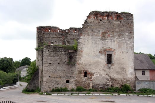 The aged destroyed city gate in the Ukrainian small town