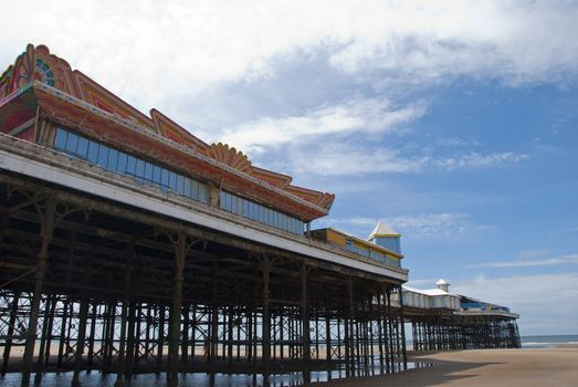 The Victorian Central Pier at Blackpool from the beach looking towards the sea