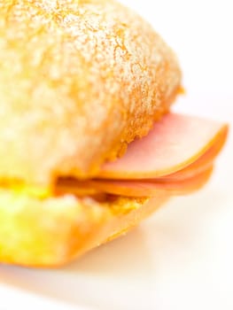 close up of a ham sandwich