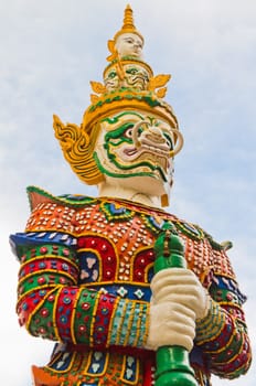 Guardian statue at the temple in Thailand