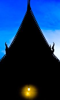 Buddhist temple in Thailand at twilight.