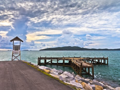 The bridge stretches out to sea in Thailand.