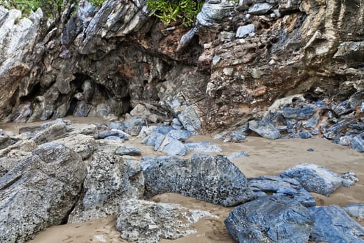 Rocks by the shore of the Sea Thailand.