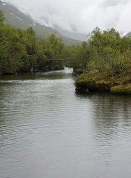 Islands in a lake connected by an old bridge