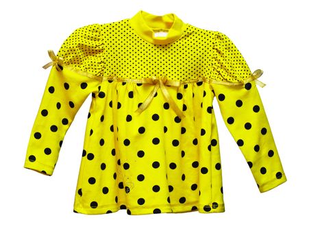 Yellow blouse with polka dots for baby isolated on white background
