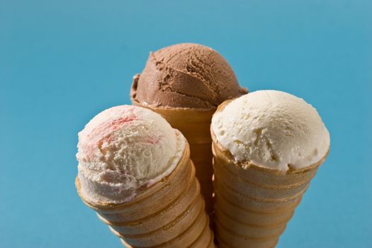 food series: chocolate and vanilla ice cream over blue