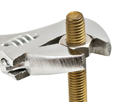 Bolt, nut and gaechy key on a white background.                                    