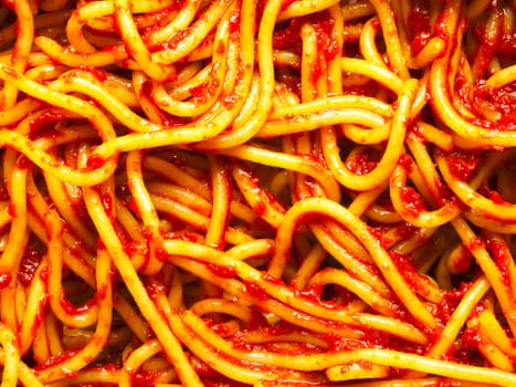 spaghetti noodles in tomato sauce food background
