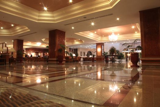 Modern hotel lobby with marble floor