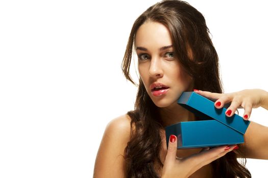 beautiful woman opening present box on white background