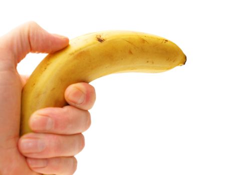 Someone pointing with a banana, isolated towards white