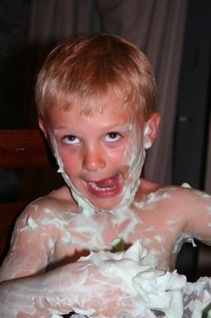 Young boy with shaving foam