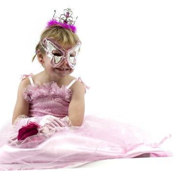 Little girl dressed up in pink for carnival