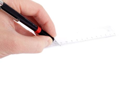 Someone drawing a straight line, with a pencil against a ruler on white paper
