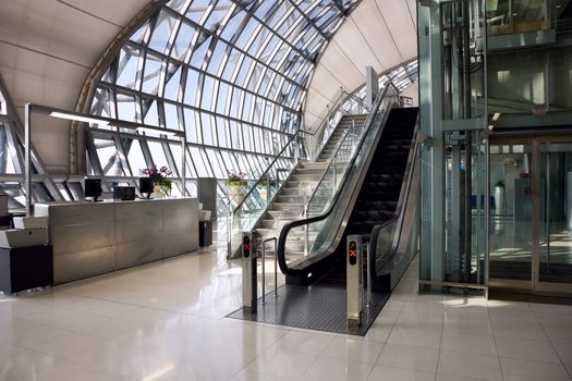 Escalator and  stair  in big modern airport, Bangkok, Thailand