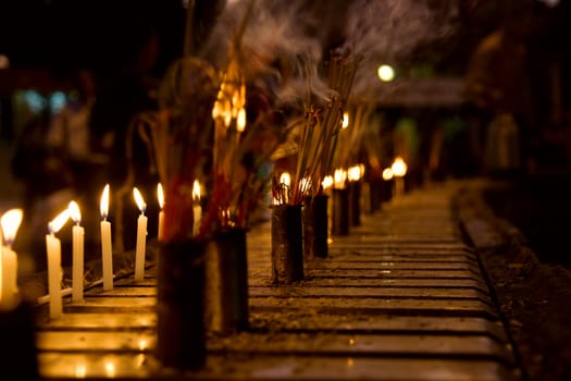 Burning Incense sticks and candle . Altar at Shwedagon Pagoda, Myanmar
