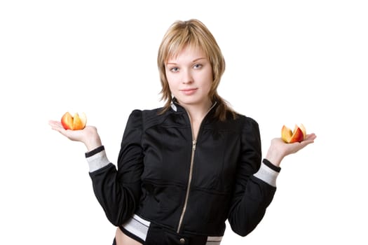 a girl hands parts of the apple in her hands