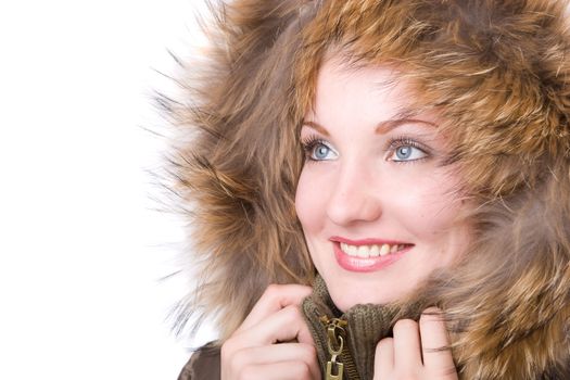 happy woman in a jacket with a fur collar