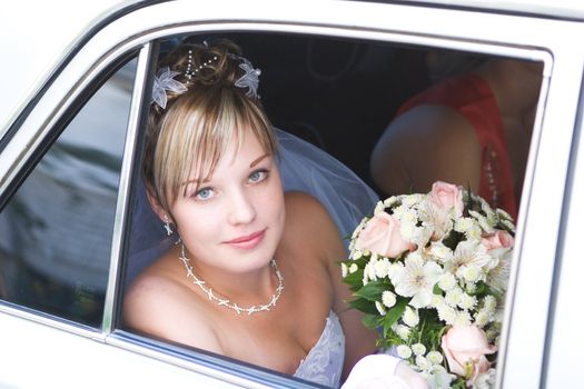 young bride in the car