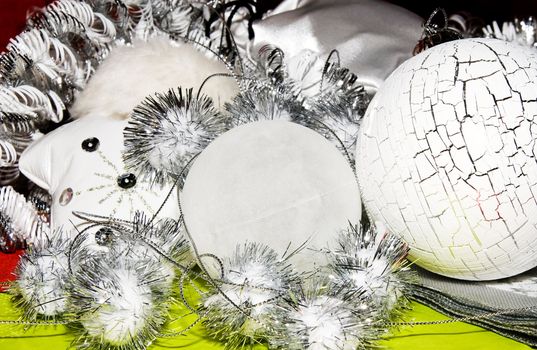 xmas decoration ornaments in white and silver and lime and little bit red