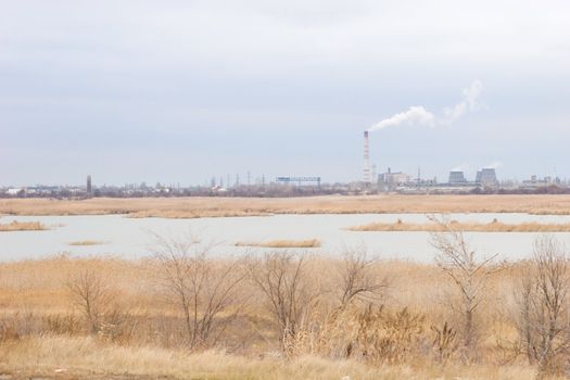 pollution of the environment as a smoke of a chimney of a factory