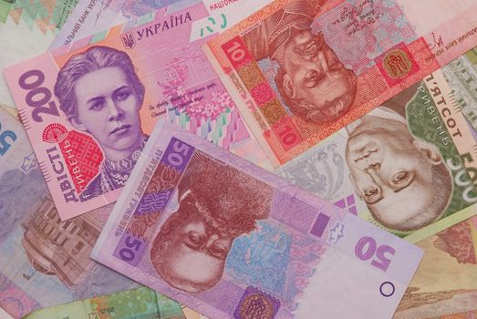 Grivnas, the Ukrainian money, greater paper denominations. Portraits of national leaders.
