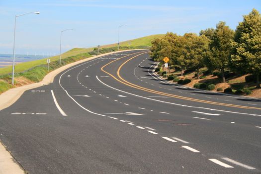 Long infinite road on a sunny day.
