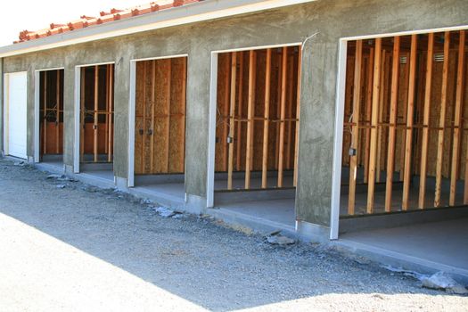 Close up of the garage building under construction.
