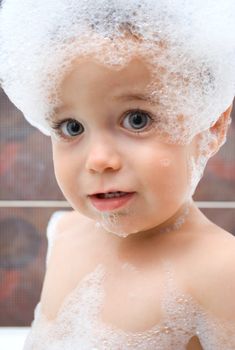 Little boy with foam on his head