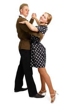 Dancing couple dressed in 60s isolated on white background