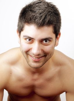 portrait of a young happy man over white