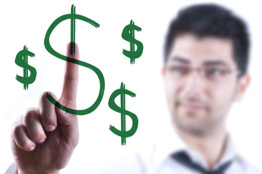 Young business man drawing dollar signs on a glass board