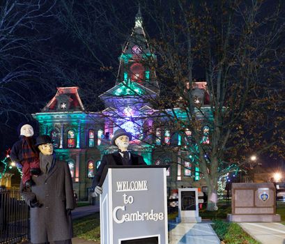CAMBRIDGE, OHIO - NOVEMBER 24: Christmas lighting on the old Court House building in Cambridge Ohio on November 24, 2011. This annual event uses Dickens characters on the main street.