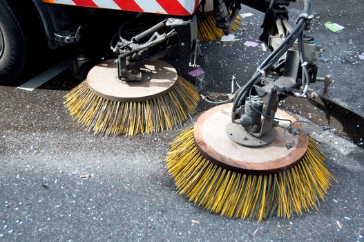 detail of a street sweeper machine/car cleaning the road