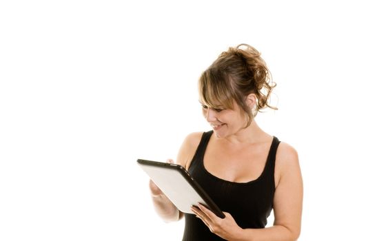 Portrait of attractive woman using a tablet computer isolated on white