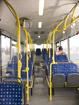 Sad woman alone on the bus