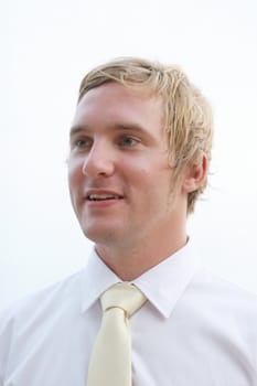 Portrait of an attractive groom on his wedding day.