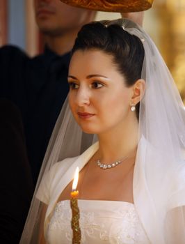 The bride on ceremony of wedding - internal church