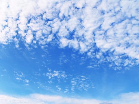 The blue sunny sky and beautiful white clouds, natural background