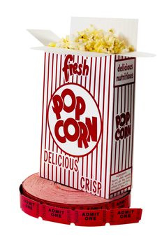 Box of popcorn on roll of movie tickets.  Isolated on white background with clipping path.