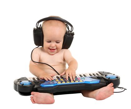 Little boy in headphones on the white background
