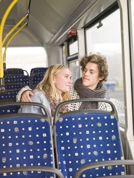 Young couple alone on the bus