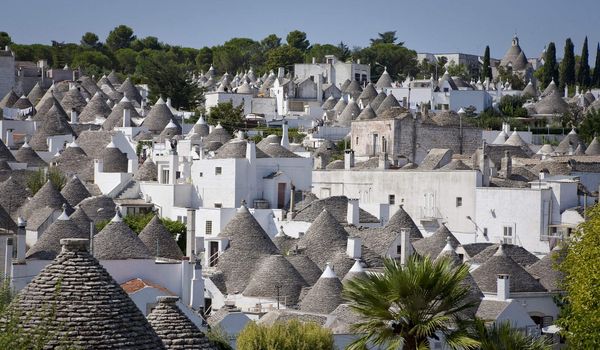 The trulli town Alberobello, Apulia - Italy. A trullo is a traditional Apulian stone dwelling with a conical roof. The style of construction is specific to Itria Valley - region of Apulia.
