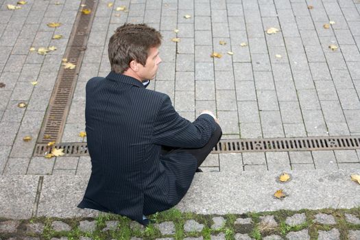 Man sitting alone looking away