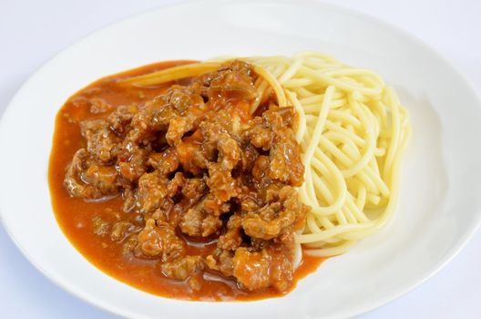 Spaghetti Bolognese is a popular cuisine , spaghetti with beef and tomato sauce