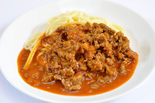 Spaghetti Bolognese is a popular cuisine , spaghetti with beef and tomato sauce