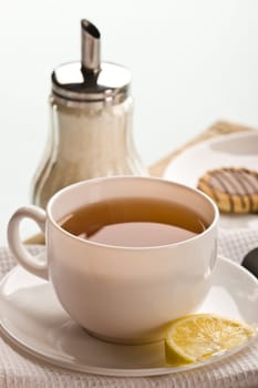 drink series: cup of tea with pastry