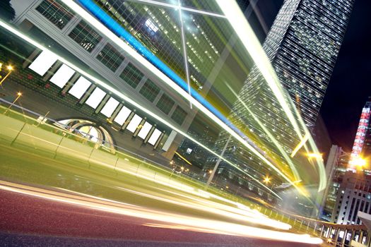 Night Light trace modern architecture background in hongkong, China. 