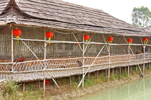 chinese wood house near water