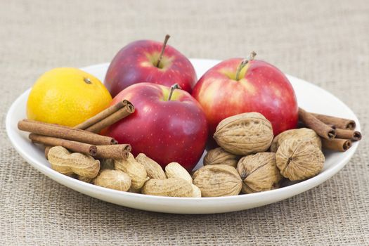 fruit, nuts and cinnamon sticks
